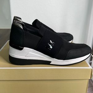 MICHAEL Michael Kors Womens Felix Leather Trim Wedge Casual and Fashion Sneakers